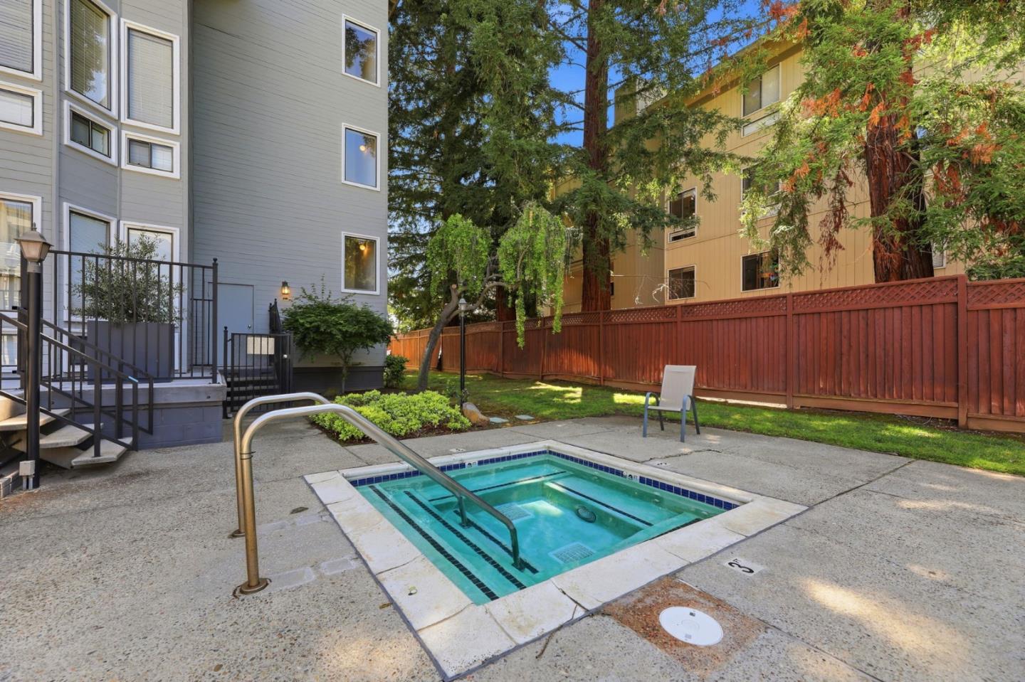 22330 Homestead Road, Unit 226 Cupertino, CA 95014 - Photo 35 of 38 a view of backyard with outdoor seating and plants