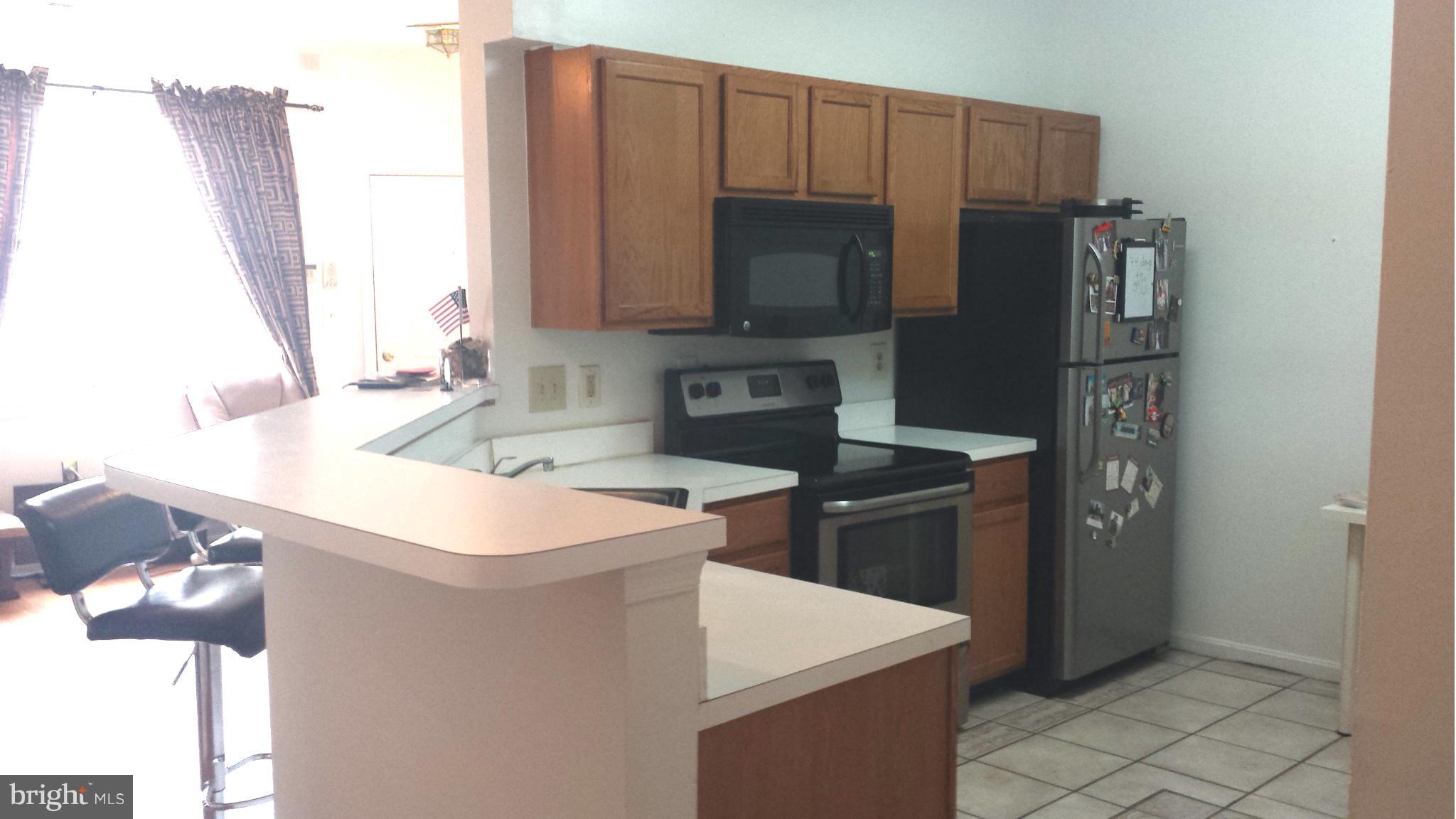 7206 Bogley Road, Unit 201 Baltimore, MD 21244 - Photo 2 of 15 Kitchen