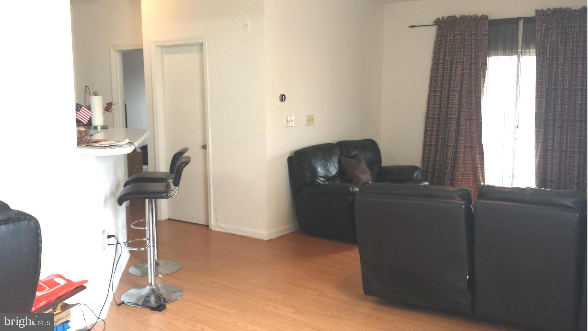 7206 Bogley Road, Unit 201 Baltimore, MD 21244 - Photo 6 of 15 Living Room