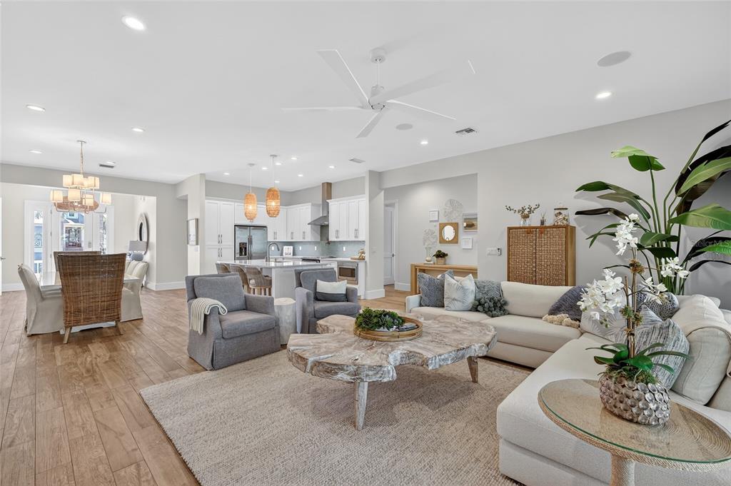 261 Seabreeze Court Boca Grande, FL 33921 - Photo 13 of 44 a living room with furniture kitchen view and a potted plant