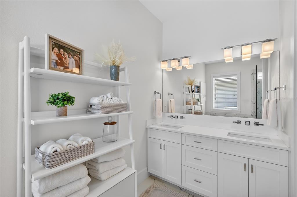 261 Seabreeze Court Boca Grande, FL 33921 - Photo 17 of 44 a bathroom with a sink double vanity and a mirror