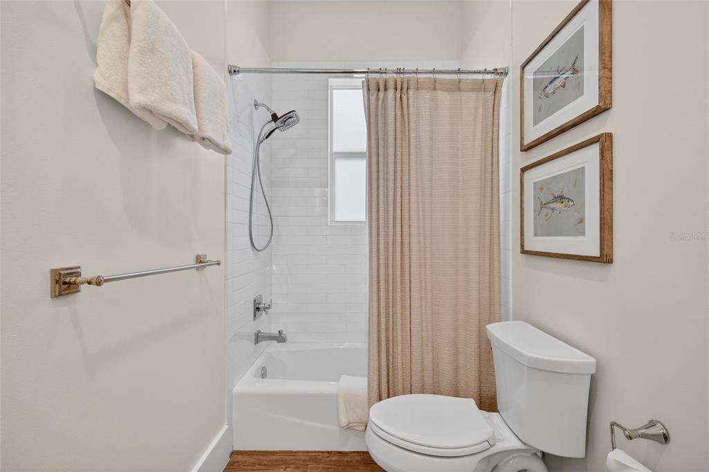 261 Seabreeze Court Boca Grande, FL 33921 - Photo 24 of 44 a bathroom with a toilet and a shower