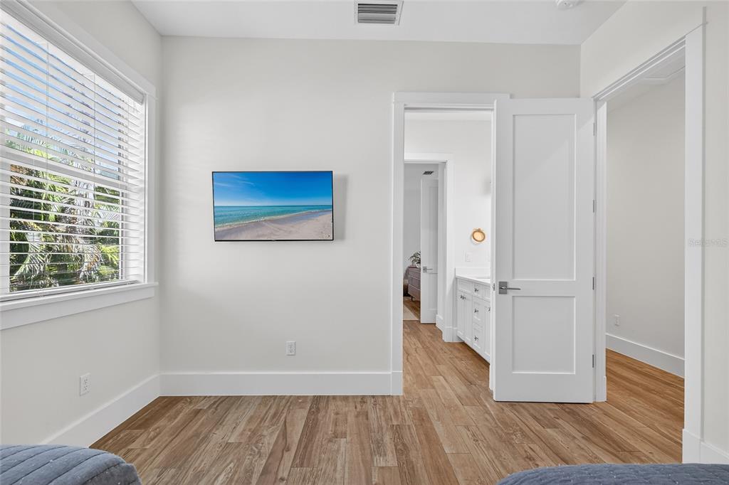 261 Seabreeze Court Boca Grande, FL 33921 - Photo 25 of 44 wooden floor in an empty room
