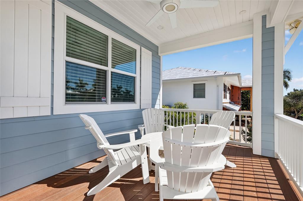 261 Seabreeze Court Boca Grande, FL 33921 - Photo 3 of 44 a view of a dining room with furniture window and wooden floor