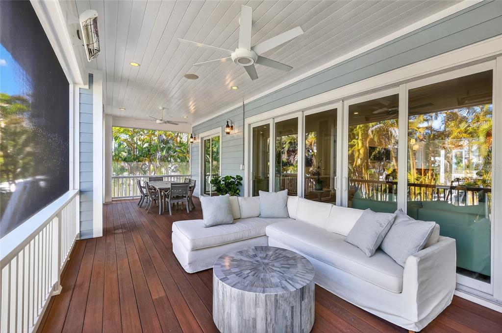 261 Seabreeze Court Boca Grande, FL 33921 - Photo 32 of 44 a living room with furniture and a large window