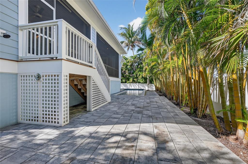 261 Seabreeze Court Boca Grande, FL 33921 - Photo 37 of 44 a view of a pathway with a house