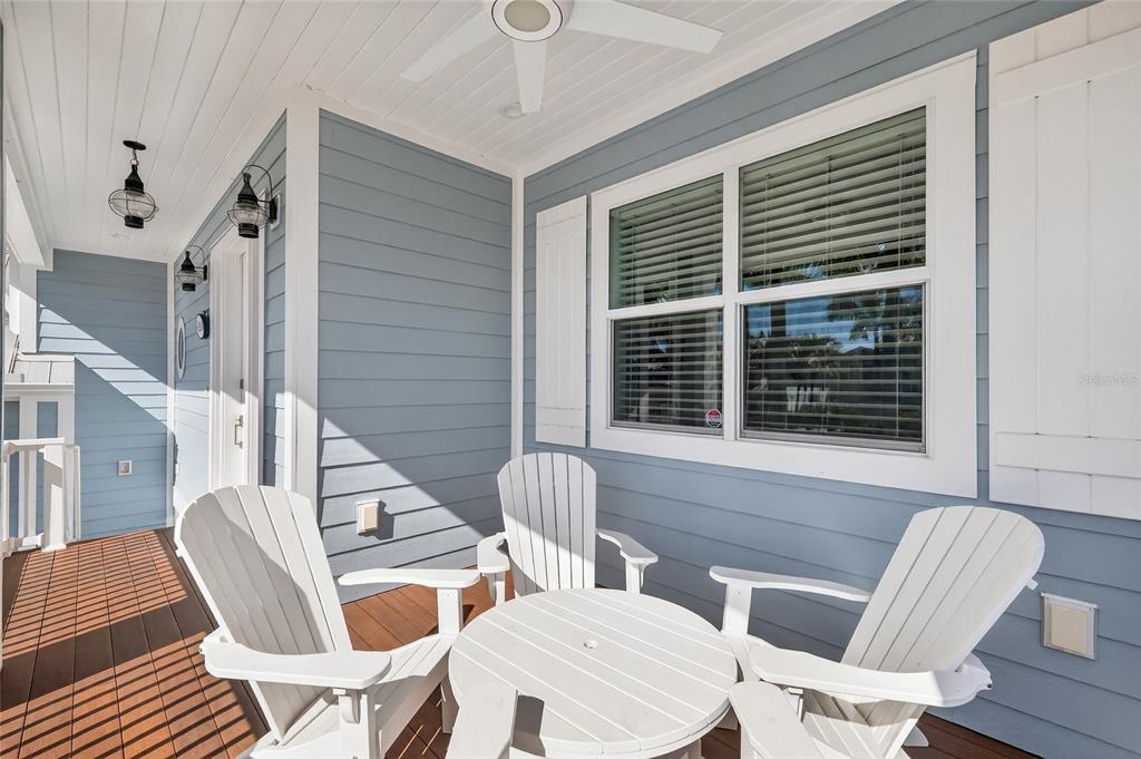 261 Seabreeze Court Boca Grande, FL 33921 - Photo 38 of 44 a view of a patio with table and chairs