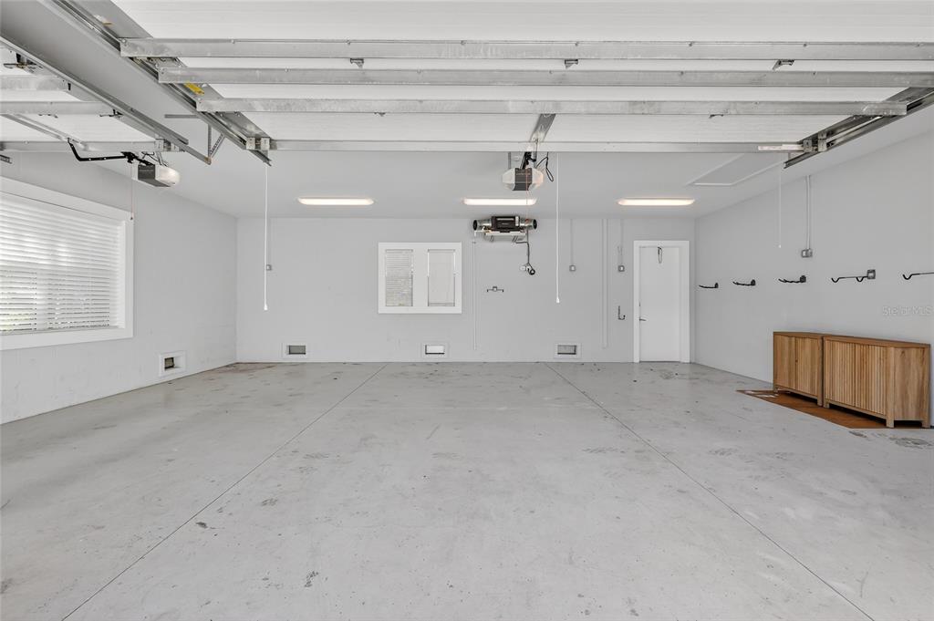 261 Seabreeze Court Boca Grande, FL 33921 - Photo 39 of 44 a view of a livingroom with a projector & cabinets