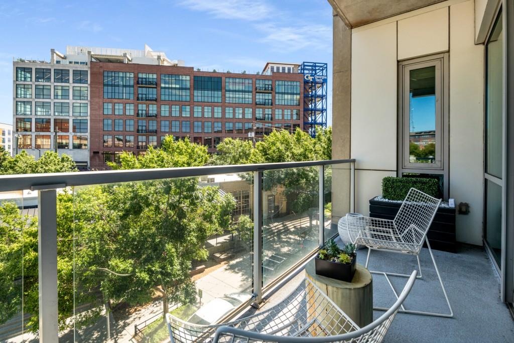 1100 Howell Mill Road Northwest, Unit 201 Atlanta, GA 30318 - Photo 19 of 50 a view of a balcony with chairs