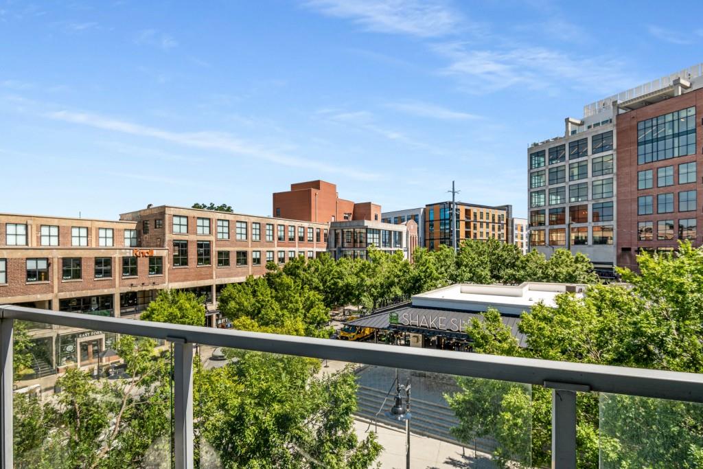 1100 Howell Mill Road Northwest, Unit 201 Atlanta, GA 30318 - Photo 20 of 50 a view of a large building from a balcony