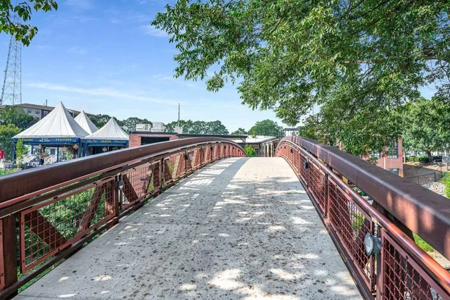 a view of a cafe with sitting area
