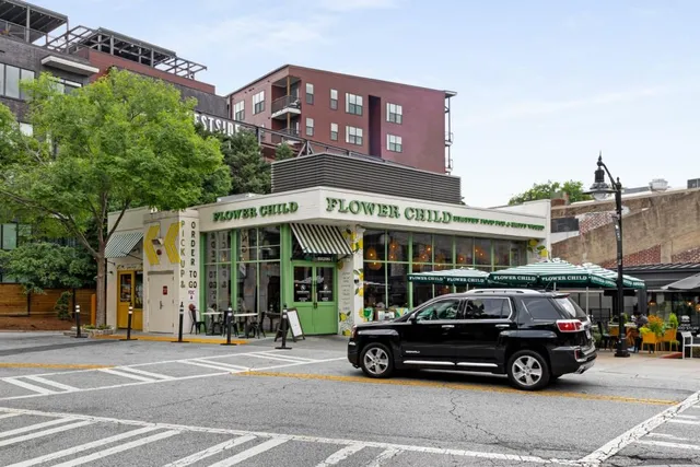 a view of a balcony with a tree