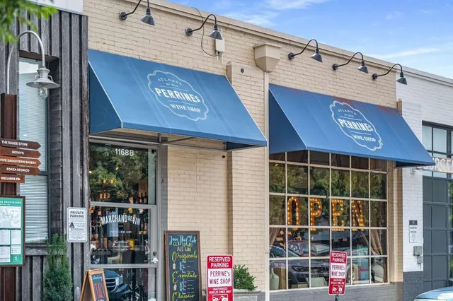 a view of a house with sitting area and garden