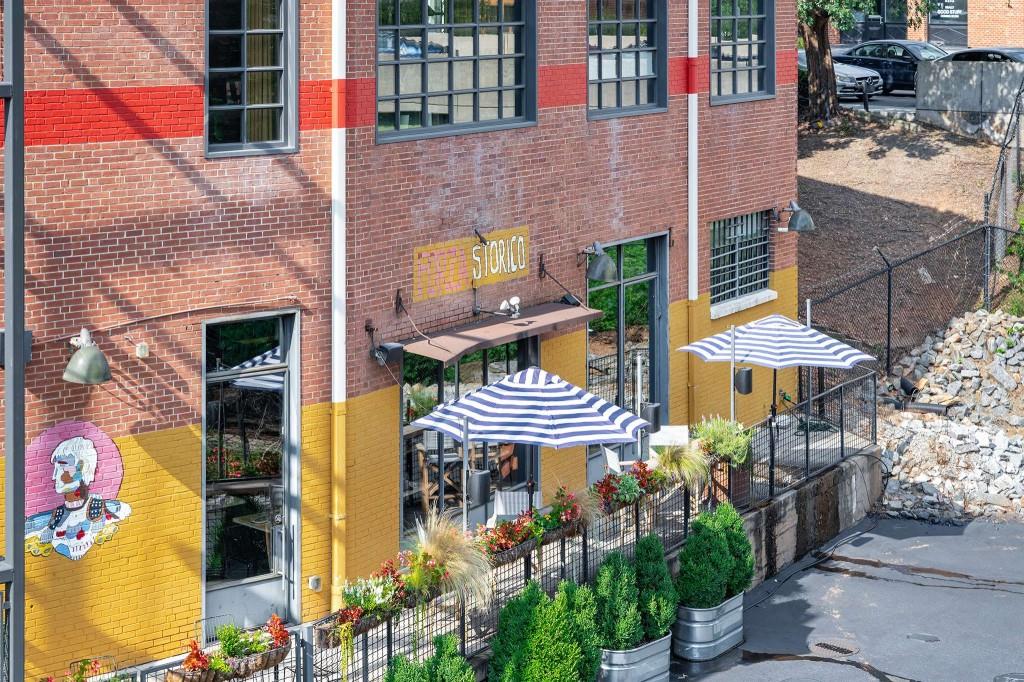 1100 Howell Mill Road Northwest, Unit 201 Atlanta, GA 30318 - Photo 43 of 50 a front view of a building with plants