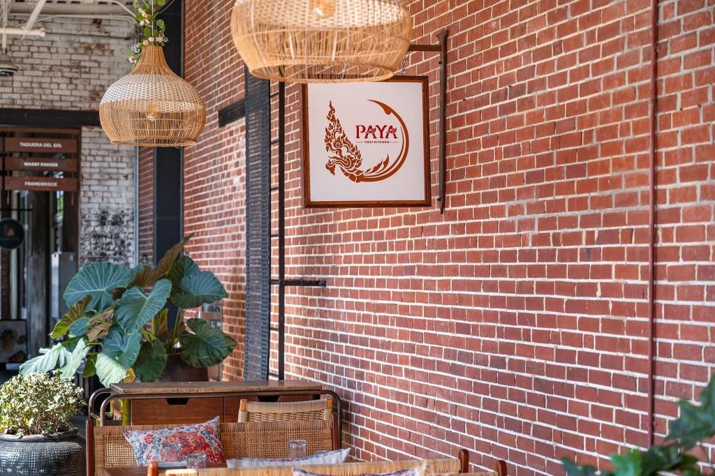 1100 Howell Mill Road Northwest, Unit 201 Atlanta, GA 30318 - Photo 46 of 50 a view of a brick wall with potted plants