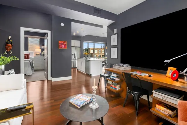 a room with furniture and wooden floor