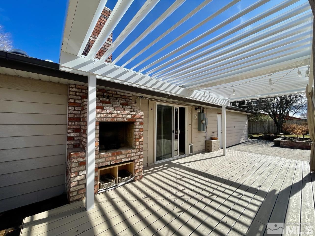 4001 Warren Way Reno, NV 89509 - Photo 25 of 28 a view of a porch with furniture and a flat screen tv