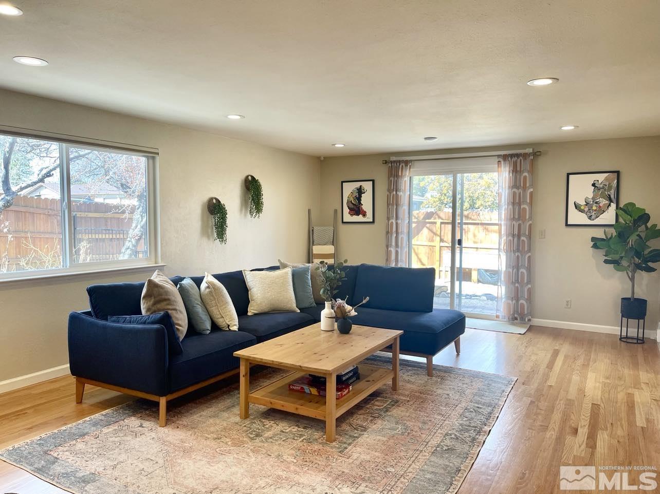 4001 Warren Way Reno, NV 89509 - Photo 3 of 28 a living room with furniture and a large window