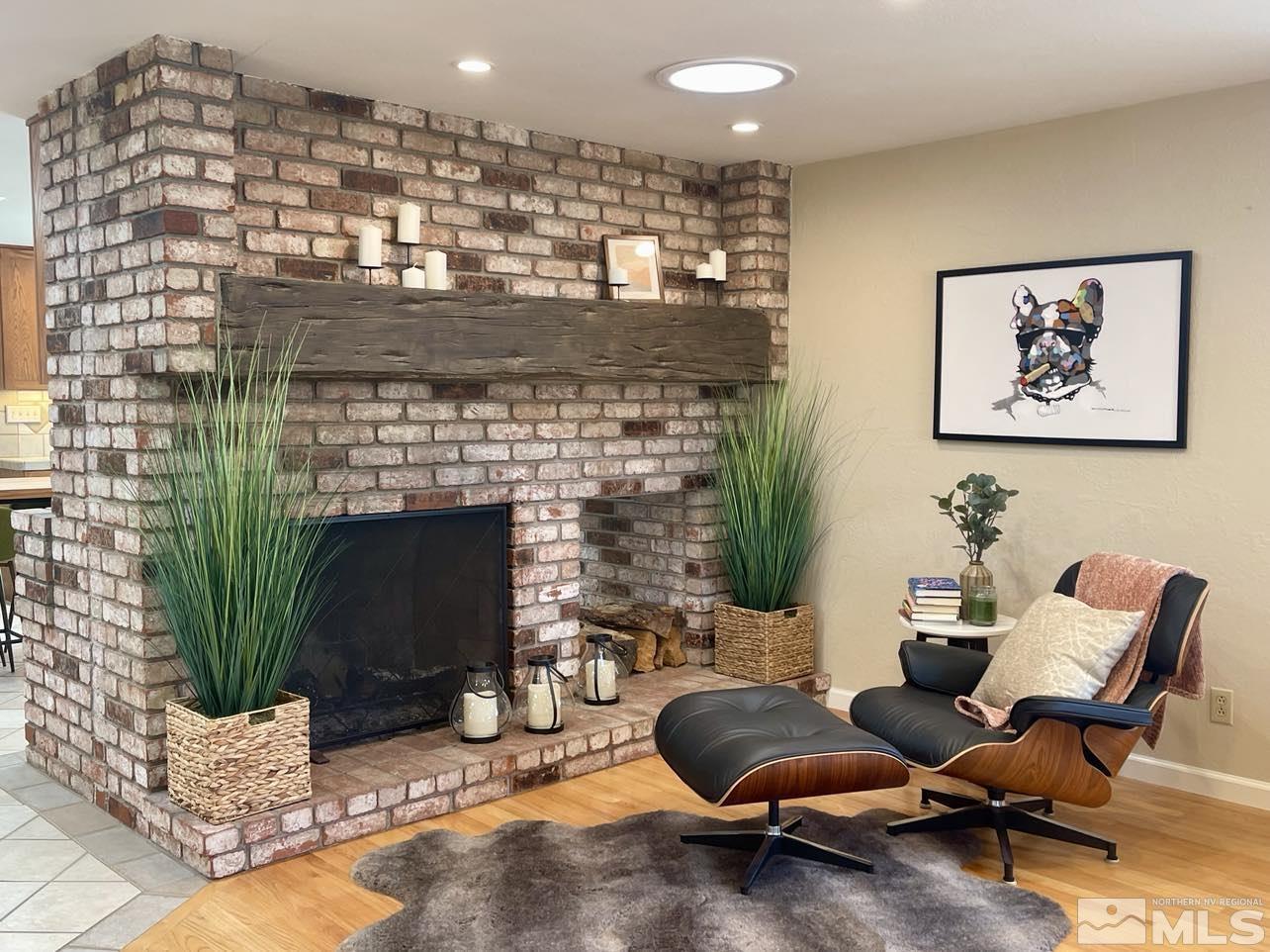 4001 Warren Way Reno, NV 89509 - Photo 5 of 28 a living room with furniture and a fireplace