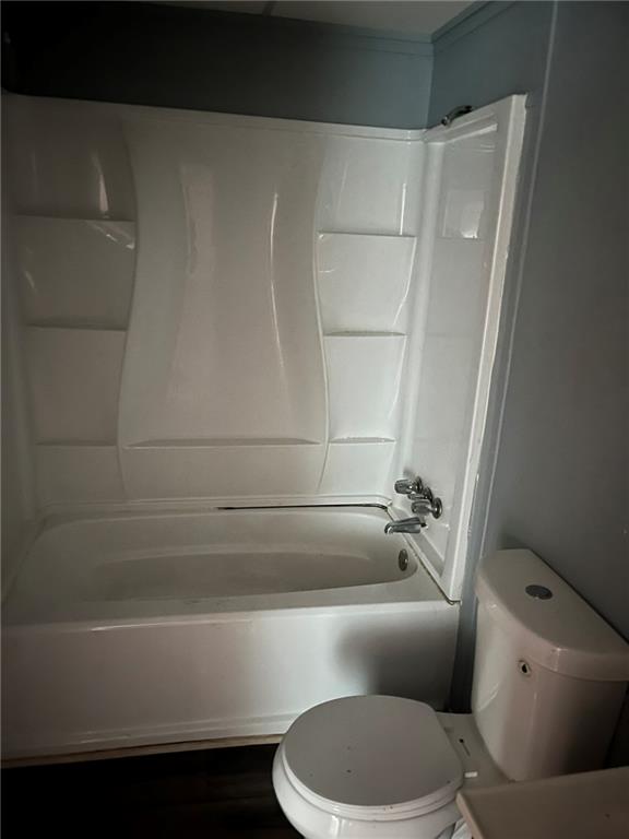 3836 Rex Circle Rex, GA 30273 - Photo 16 of 17 a bathroom with a toilet and a bathtub
