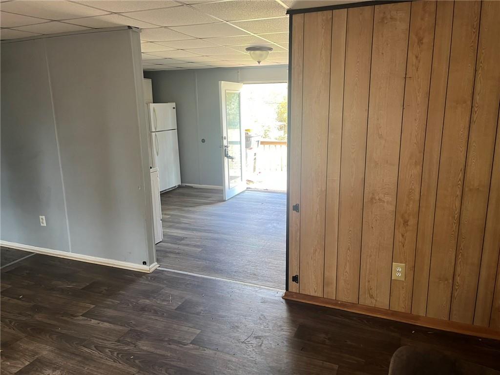 3836 Rex Circle Rex, GA 30273 - Photo 10 of 17 an empty room with wooden floor & windows