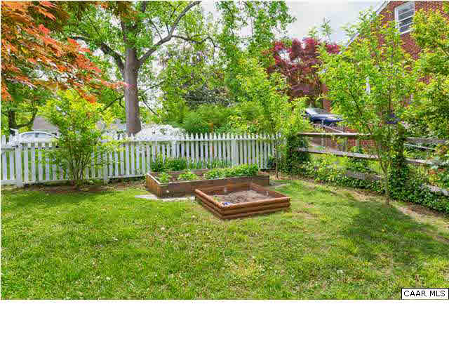 1505 Rutledge Avenue Charlottesville, VA 22903 - Photo 18 of 21 Relatively level and private rear yard features mature landscaping. Owners have planted many fruit trees and other edible landscaping in their 4 years here.