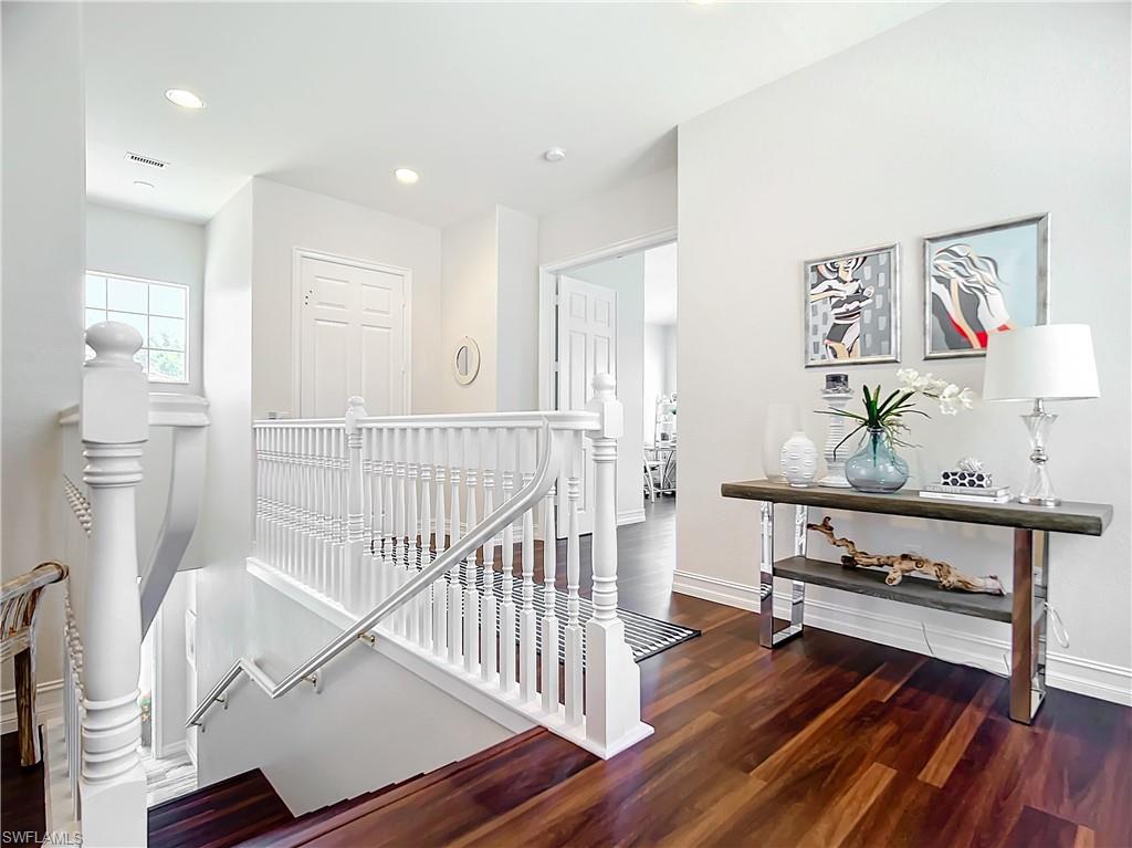 4752 Stratford Court, Unit 1404 Naples, FL 34105 - Photo 7 of 34 a view of livingroom with furniture and wooden floor
