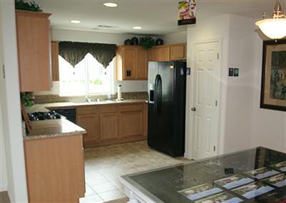 200 East Huntsman Avenue Reedley, CA 93654 - Photo 3 of 4 Please note that pic is of a model home. Completed home may vary.