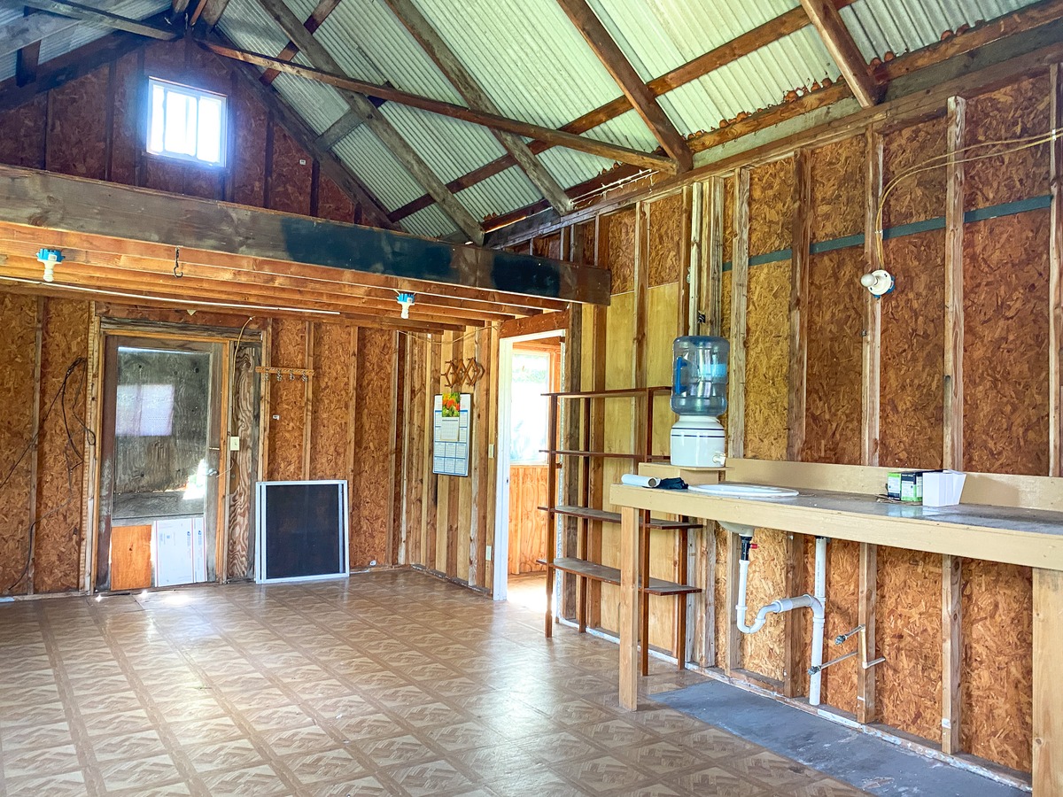 94-1488 Kala Place Naalehu, HI 96772 - Photo 14 of 19 a view of an empty room with a window