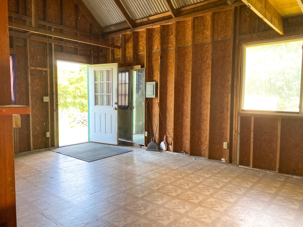 94-1488 Kala Place Naalehu, HI 96772 - Photo 15 of 19 a view of empty room with wooden floor