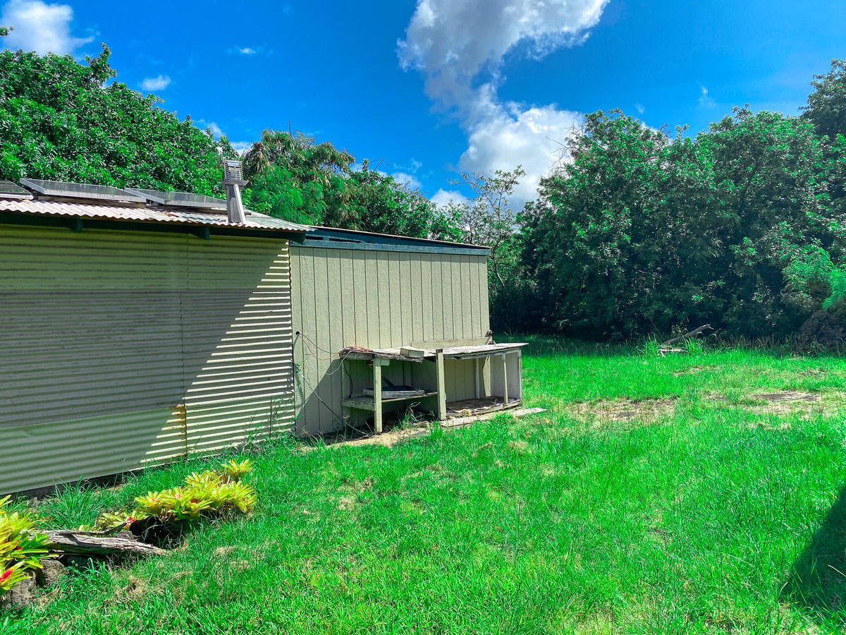 94-1488 Kala Place Naalehu, HI 96772 - Photo 7 of 19 a view of a house with a yard
