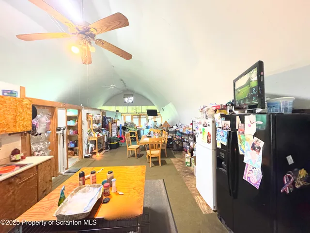 a room with furniture and a wooden floor