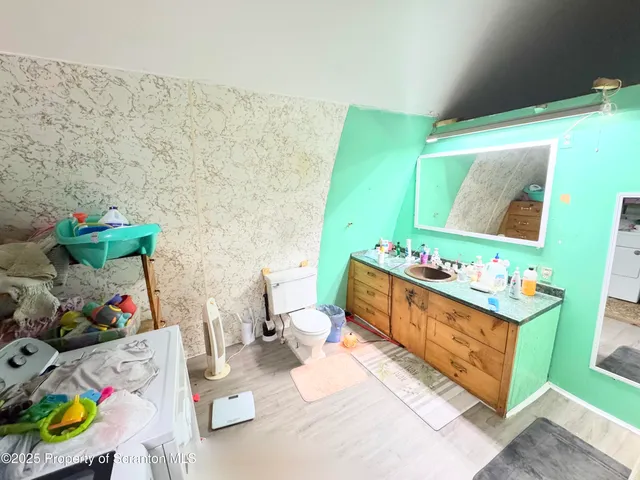 a group of people sitting in a living room