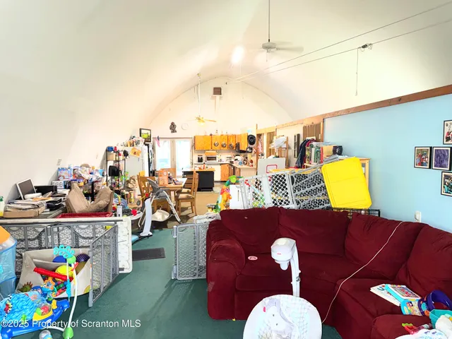 a view of a park with big houses