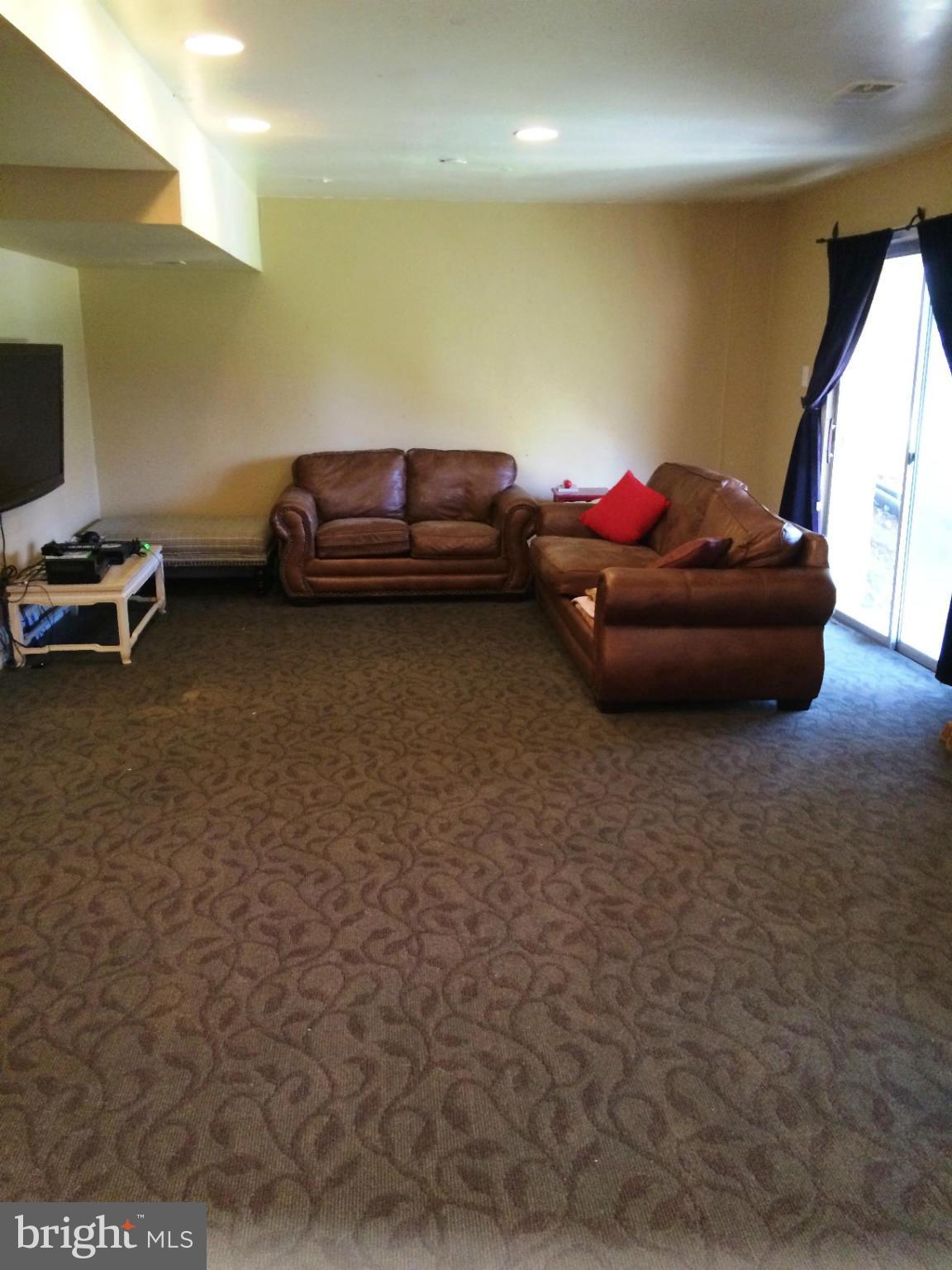7 Treworthy Road Gaithersburg, MD 20878 - Photo 11 of 18 Family Room on lower level