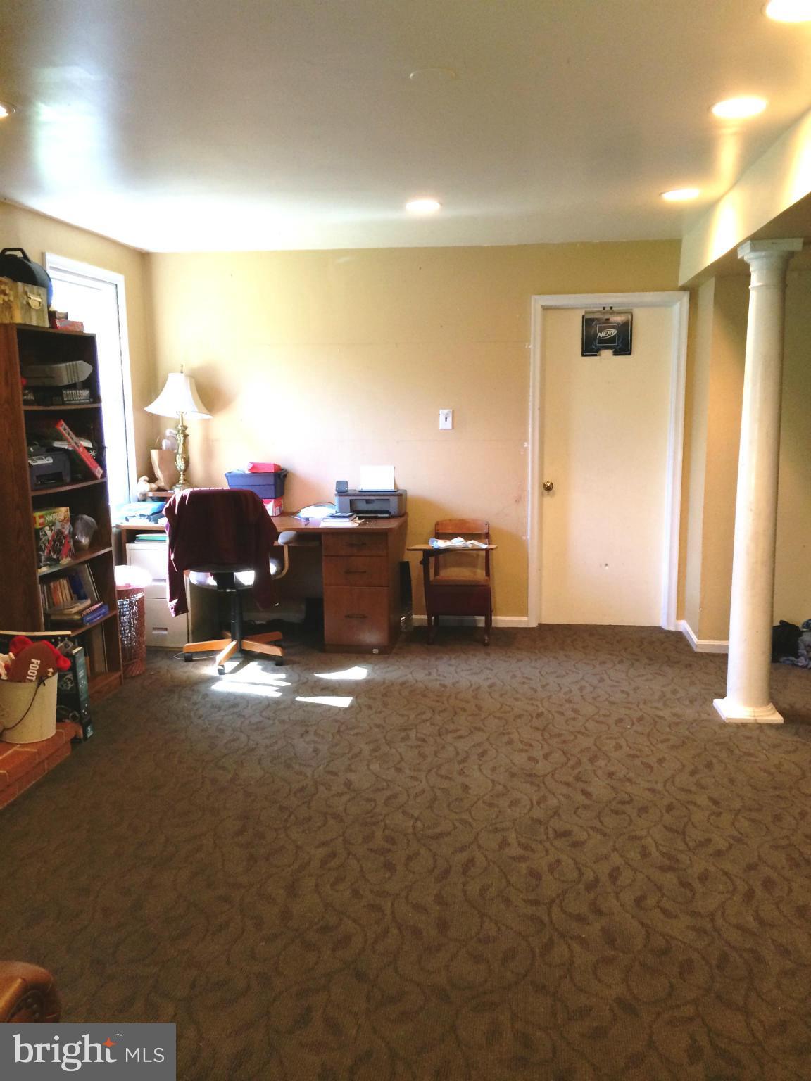 7 Treworthy Road Gaithersburg, MD 20878 - Photo 12 of 18 Family Room on Lower Level View 2