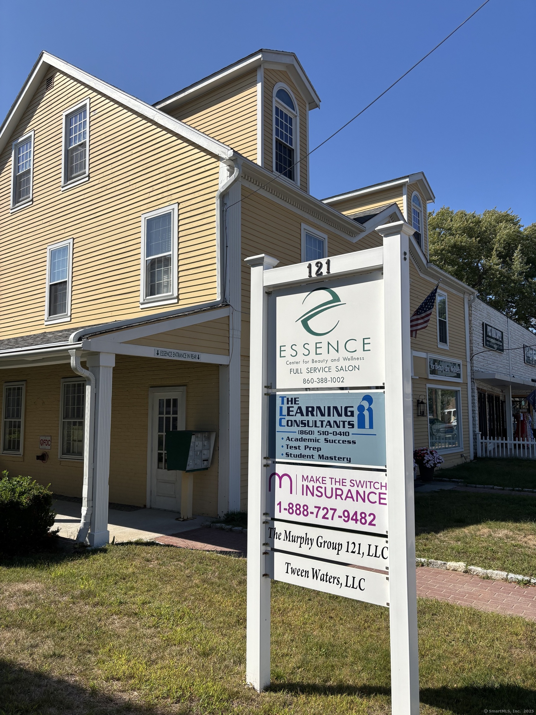 125 Main Street Old Saybrook, CT 06475 - Photo 12 of 30 a sign on the side of a building