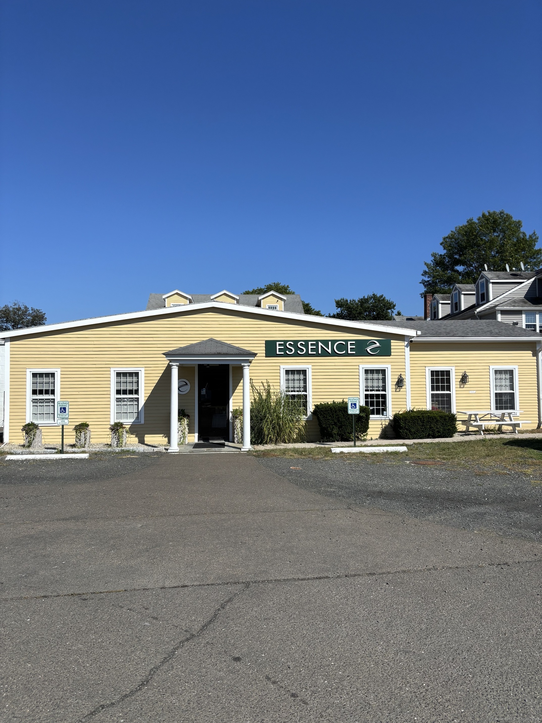 125 Main Street Old Saybrook, CT 06475 - Photo 13 of 30 a front view of a house with a road
