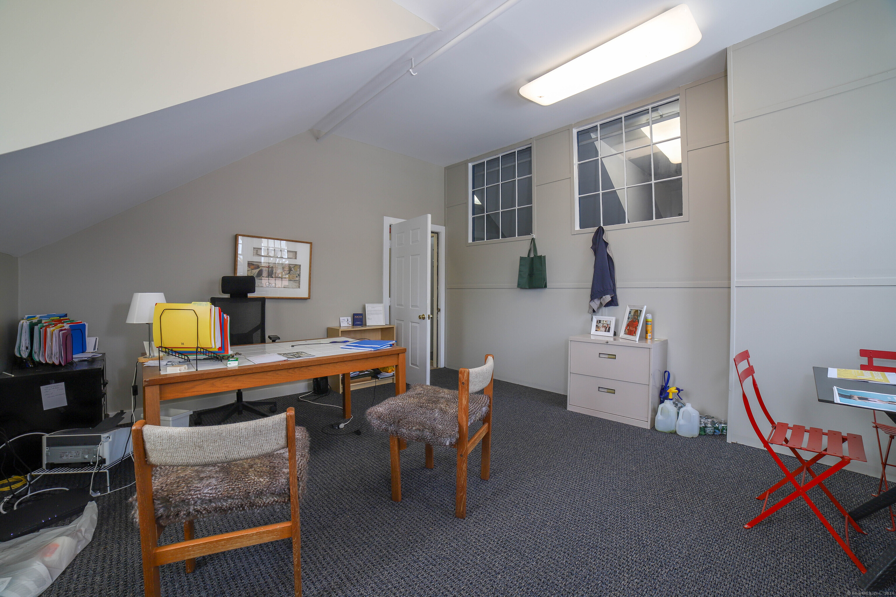 125 Main Street Old Saybrook, CT 06475 - Photo 16 of 30 a room with furniture a rug toys and a window