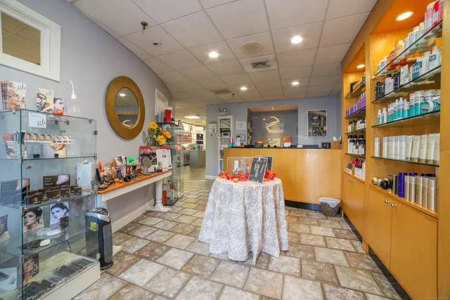 a room with lots of wooden furniture and lots of wooden furniture