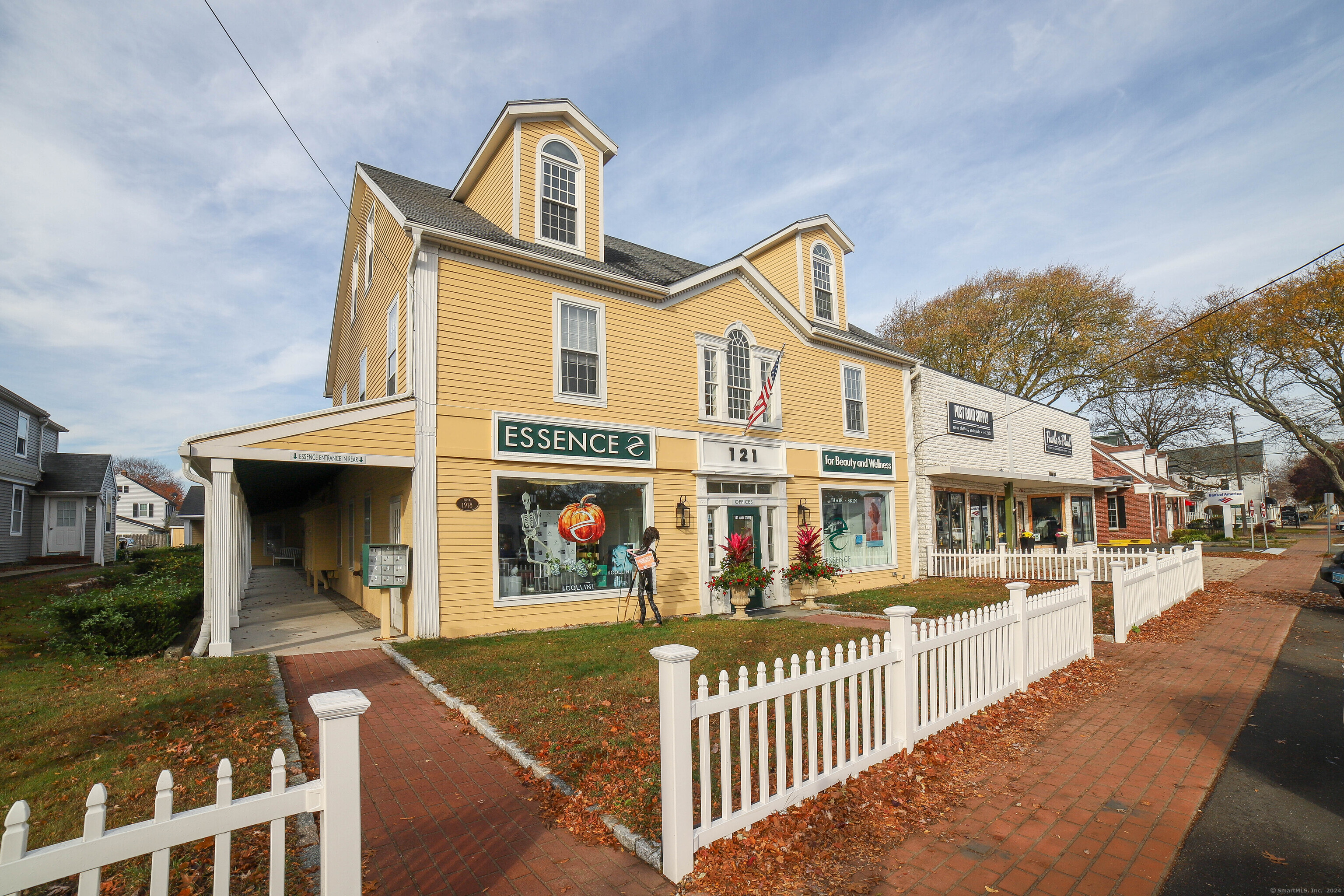 125 Main Street Old Saybrook, CT 06475 - Photo 10 of 30 a front view of a house with a yard