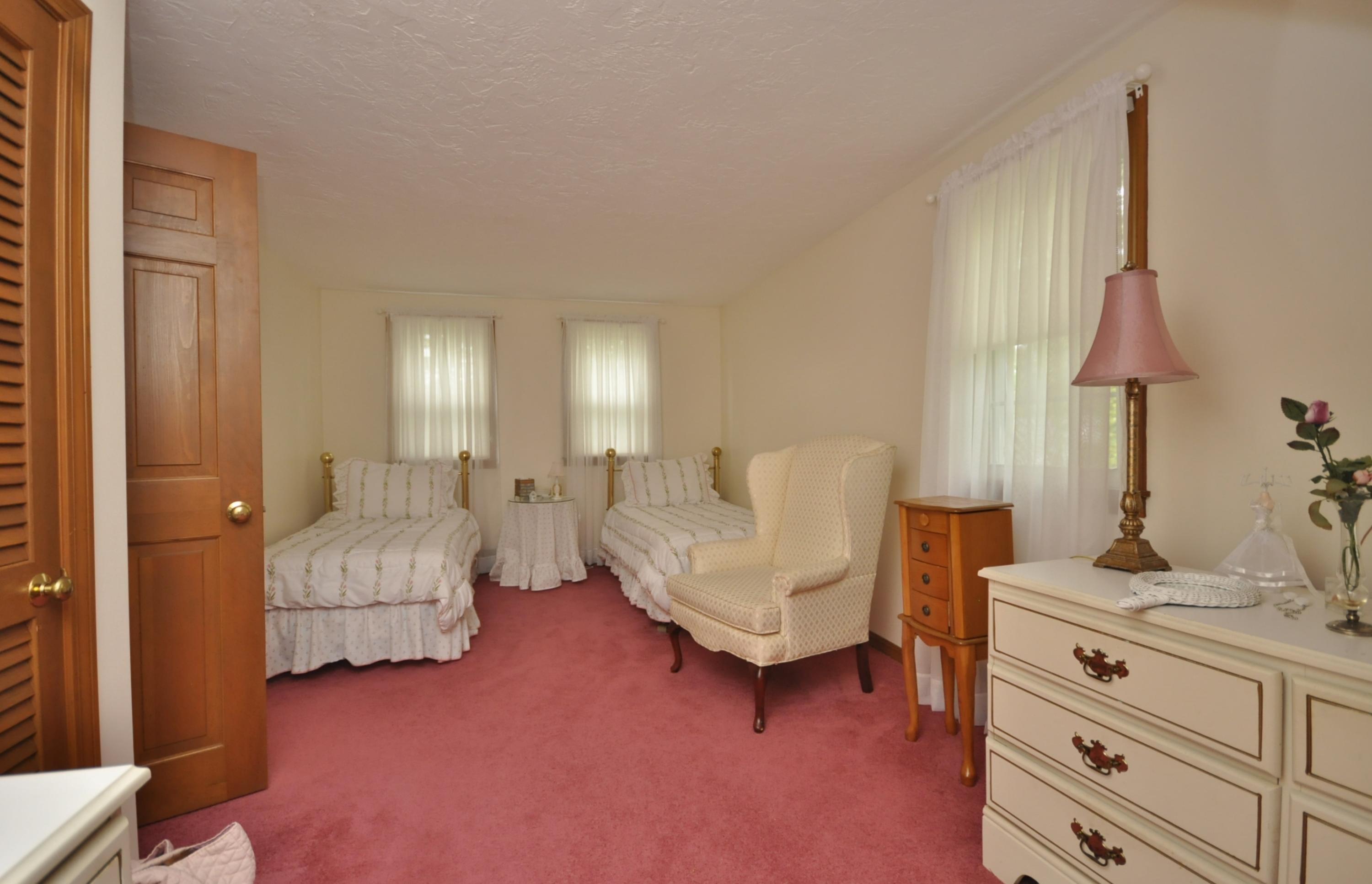 30 Longfellow Road Sagamore Beach, MA 02562 - Photo 13 of 21 a living room with furniture and a lamp