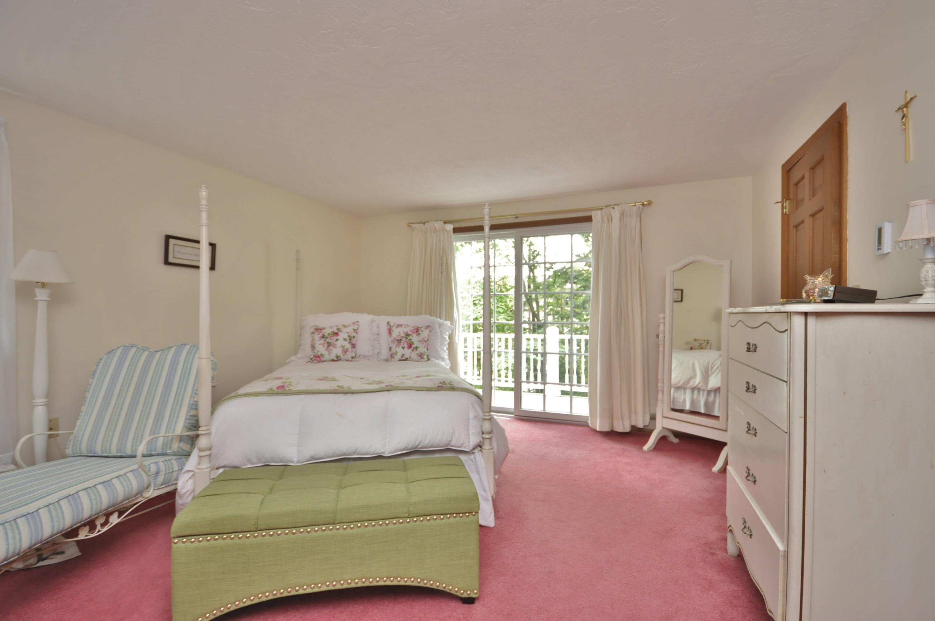 30 Longfellow Road Sagamore Beach, MA 02562 - Photo 16 of 21 a bedroom with a bed couch and a window