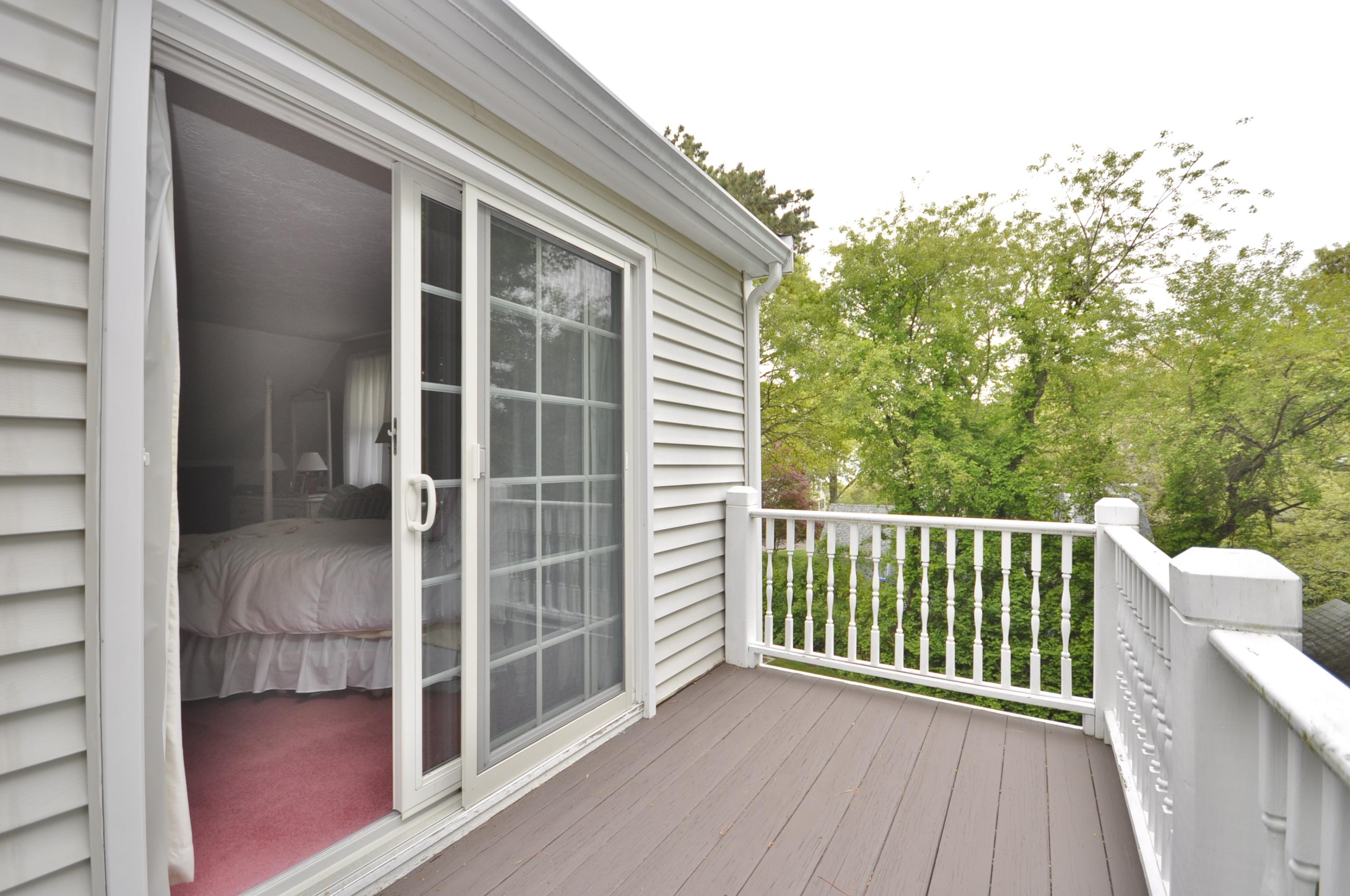 30 Longfellow Road Sagamore Beach, MA 02562 - Photo 17 of 21 a view of a balcony with a large window