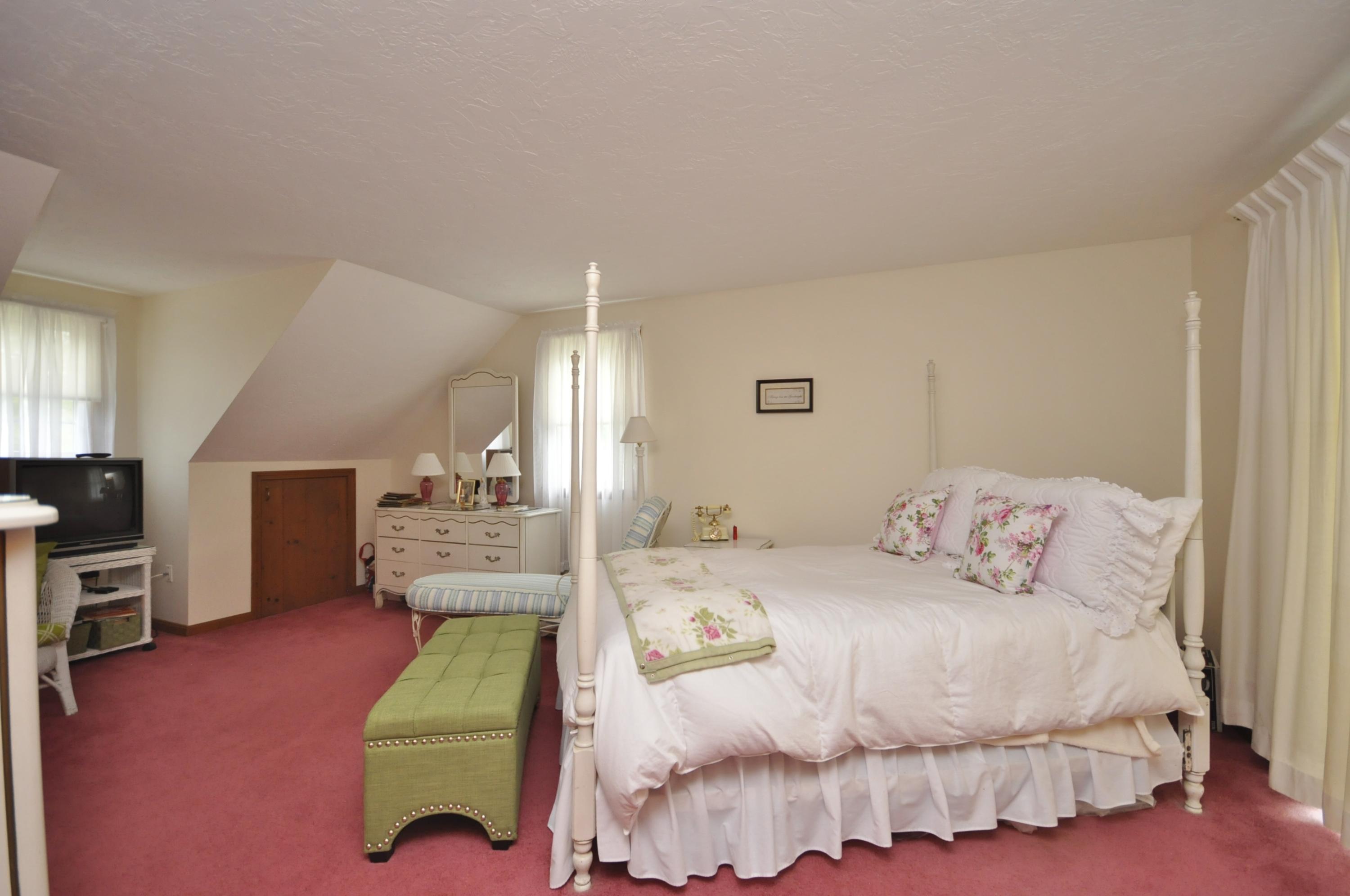 30 Longfellow Road Sagamore Beach, MA 02562 - Photo 18 of 21 a bedroom with a bed and a television
