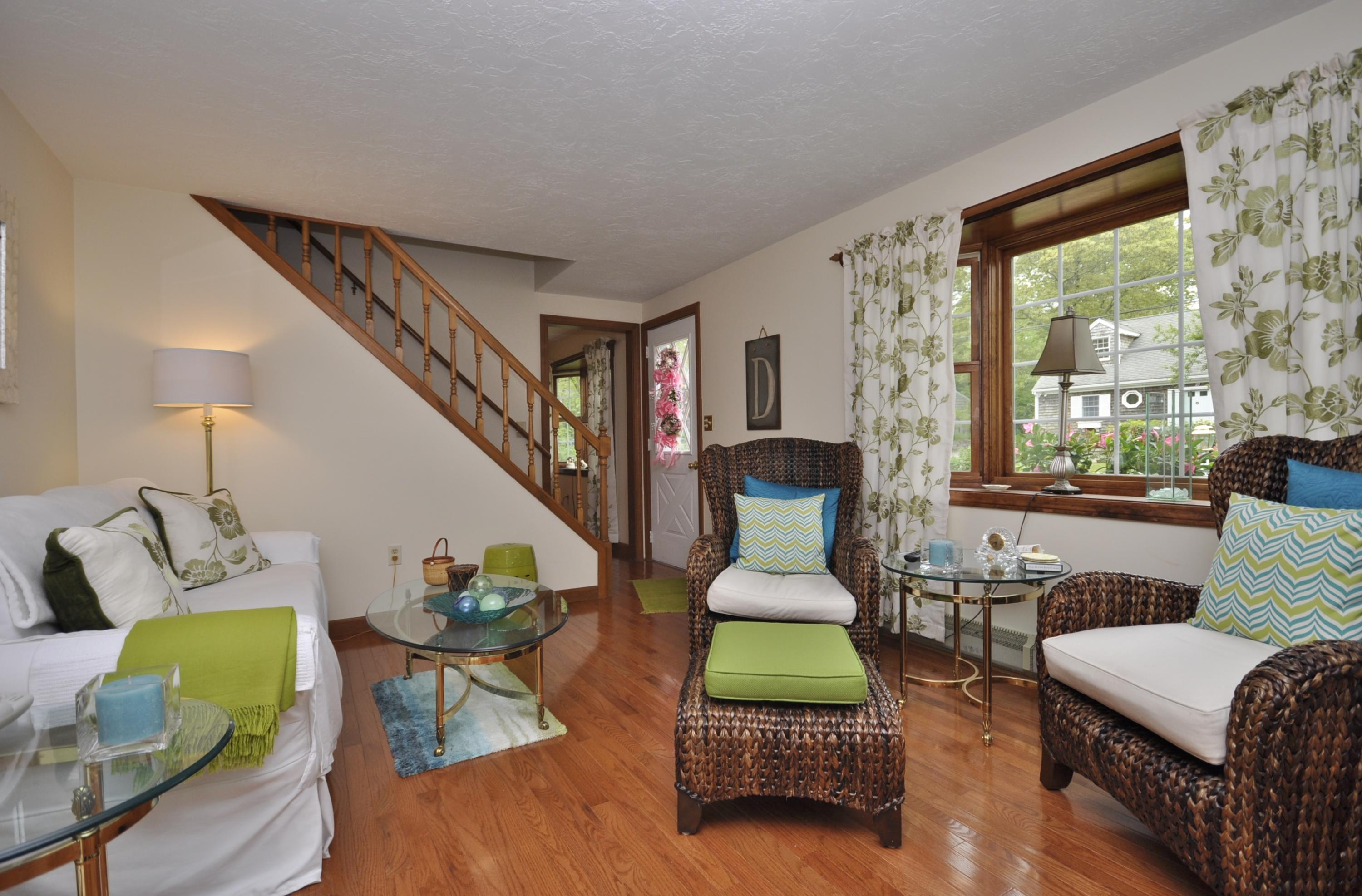 30 Longfellow Road Sagamore Beach, MA 02562 - Photo 6 of 21 a living room with furniture and a large window
