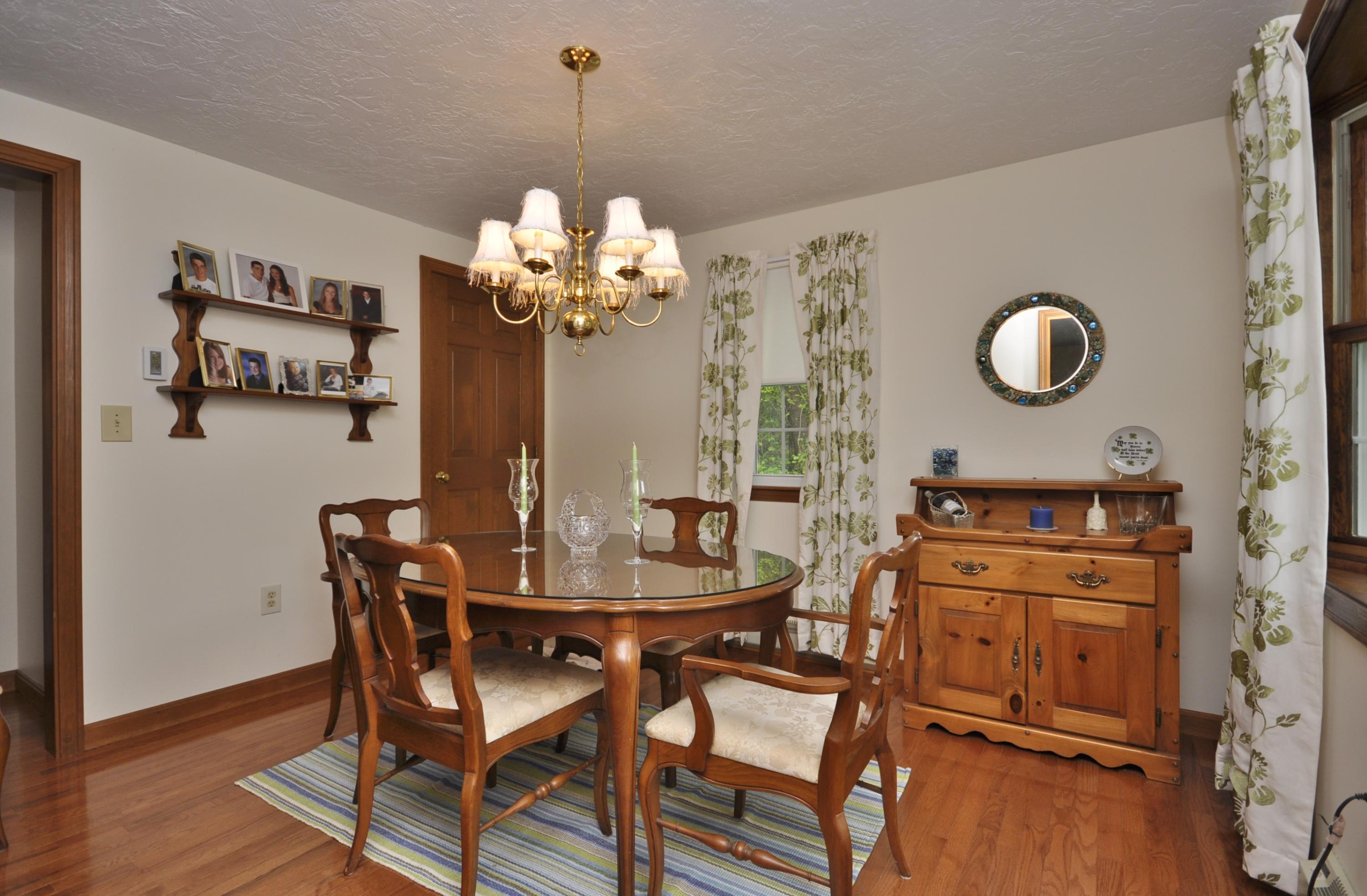 30 Longfellow Road Sagamore Beach, MA 02562 - Photo 10 of 21 a view of a dining room with furniture and wooden floor