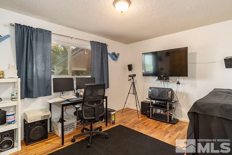 3450 Bryan Street Reno, NV 89503 - Photo 18 of 18 a view of a livingroom with workspace and a window