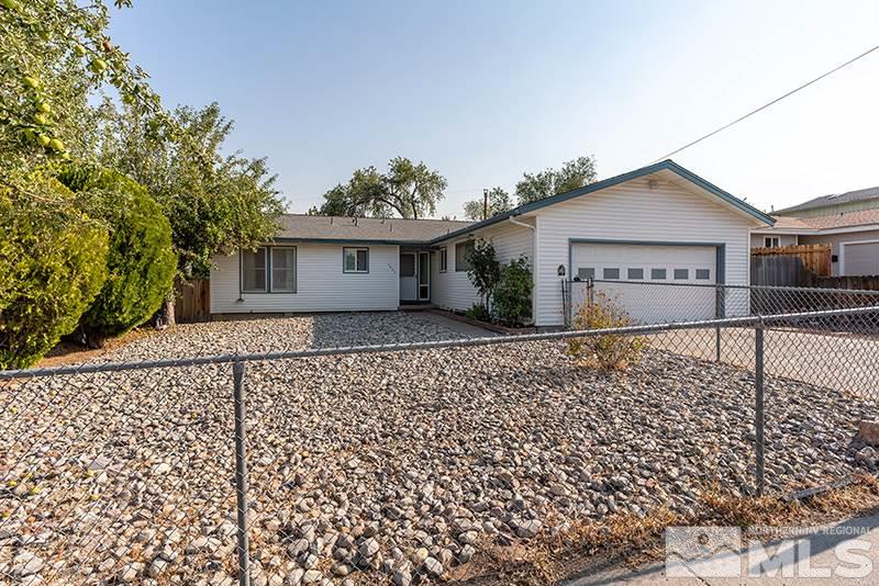 3450 Bryan Street Reno, NV 89503 - Photo 3 of 18 front view of a house with a bench