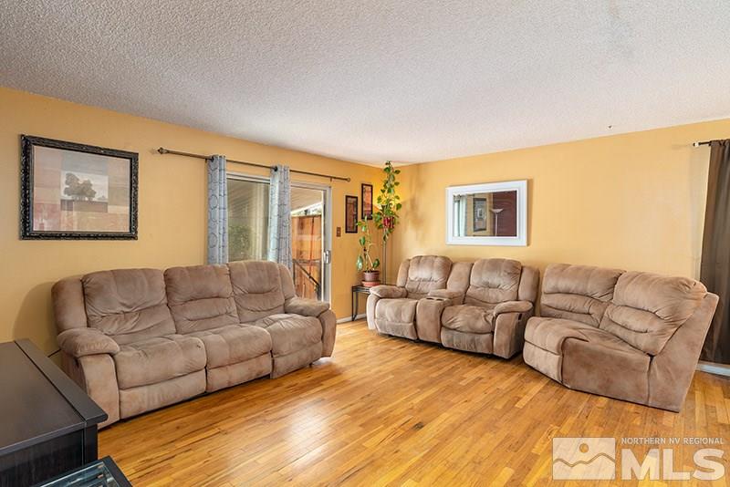 3450 Bryan Street Reno, NV 89503 - Photo 6 of 18 a living room with furniture and a couch